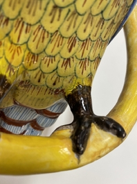 A polychrome Dutch Delft model of a parrot on a ring, 18th C.